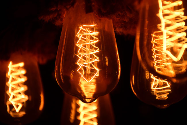 close up of lit up light bulbs